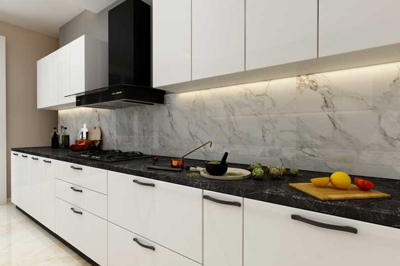 L-shaped kitchen with fluroescent orange and dove grey finish