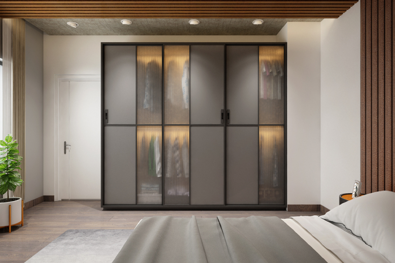 L-shaped kitchen with fluroescent orange and dove grey finish